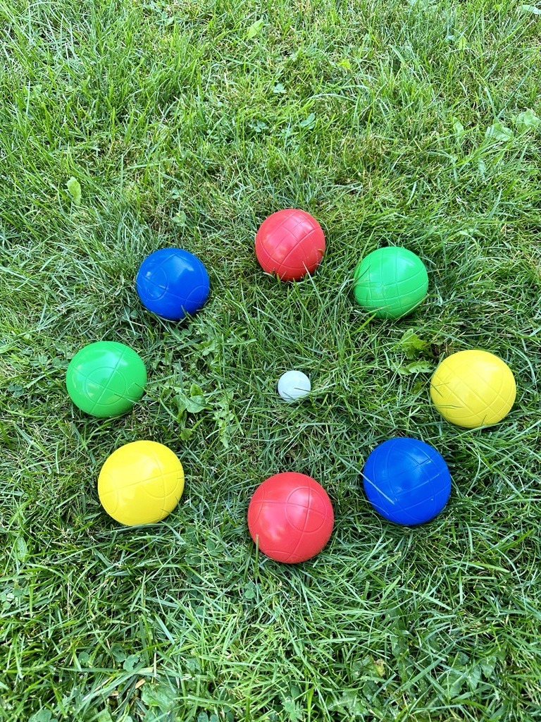 8 bocce balls in various colours